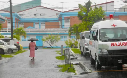 A rainy day outside Georgetown Public Hospital's Psychiatric Ward. Image by Madeline Bishop. Guyana, 2017.