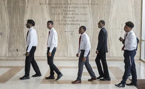 Freshmen enter the Morehouse chapel named for Martin Luther King, Jr., whose words are etched on the wall. Image by Radcliffe "Ruddy" Roye. United States, 2017.