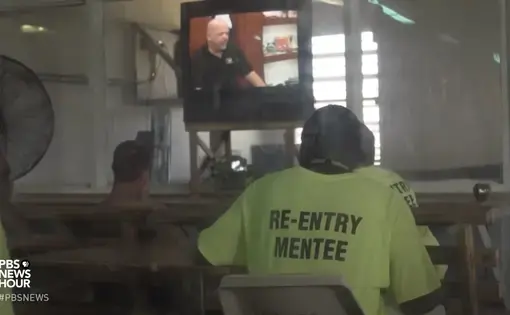 A re-entry mentee in the Louisiana state prison system. Image by PBS NewsHour. United States, 2018.