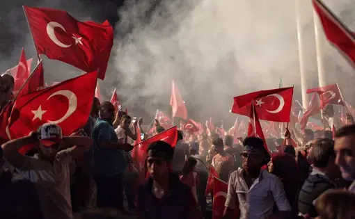 Supporters of Turkish President Recep Tayyip Erdogan in Istanbul’s Taksim Square, Image by Kursat Bayhan/Getty Images. Turkey, 2016.