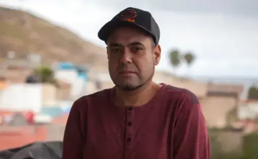 Deported veteran Miguel Perez stands for a portrait in Tijuana, Mexico on May 7, 2019. After being pardoned by Illinois Gov. JB Pritzker, he is asking officials to reconsider his citizenship application. Image courtesy of Erin Siegal McIntyre. Mexico, 2019.