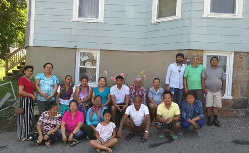 A group of Bhutanese refugees residing in the greater Worcester area with Purna Neupane (second from right) and Harvard Medical School researcher Dr. Nadeem Kasmani (third from right). Image by Ani Gururaj. Massachusetts, 2018.