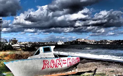 Boat wreck in Milazzo, Italy. Image courtesy of Sarah Tzinieris. Italy, 2015.