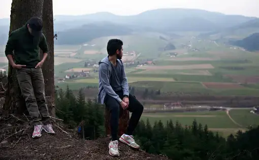 Rafat and Naif on the overlook in the Black Forest near Zell am Hammersbach, Germany. Image by Holly Pickett. Germany, 2014. Rafat and Naif on the overlook in the Black Forest near Zell am Hammersbach, Germany. Image by Holly Pickett. Germany, 2014.
