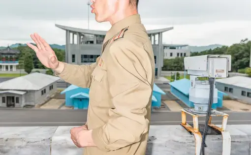 A military officer at the D.M.Z. This summer, the prospect of a nuclear confrontation between the United States and North Korea, the most hermetic power on the globe, entered a realm of psychological calculation reminiscent of the Cold War. Image by Max Pinckers/The New Yorker. North Korea, 2017.