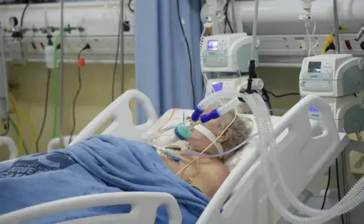 Doctors take care of patients with COVID-19. An intensive care unit at the hospital São José specialized in the treatment of COVID-19. Image by Photocarioca/Shutterstock. Duque de Caxias, Brazil, May 20, 2020.