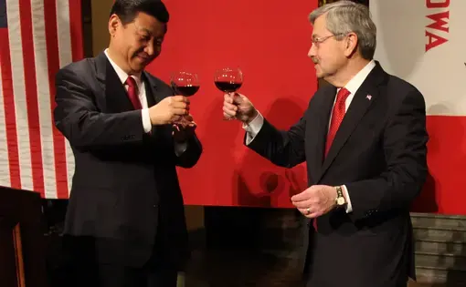 Chinese President Xi Jinping, left, shares a toast with U.S. Amb. Terry Branstad in February 2012 at the Iowa State Capitol in Des Moines. Xi, then vice president, and Branstad, then Iowa’s governor, first met in 1985 in Iowa. Image by Kelsey Kremer. United States, 2012.