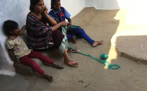 Family members of Shiv Kumari, who was killed at the sterilization camp. Image by Hannah Harris Green. India, 2018