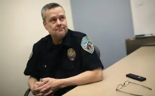 In this Feb. 23, 2019, photo, new police chief Robert Estes speaks to the Associated Press in Nome, Alaska. Estes replaced the outgoing chief after public complaints that the police department had mishandled sexual assault cases in Nome. Image by Wong Maye-E. United States, 2019.