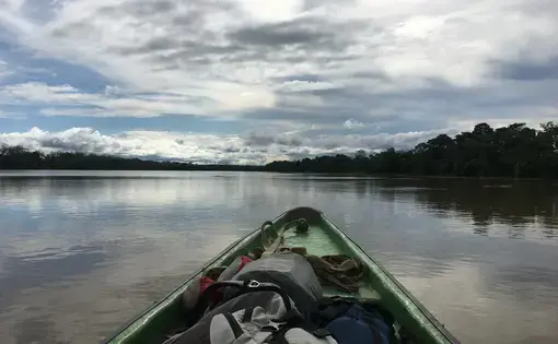 Motoring up the Atrato River toward the Darien frontier. Photo by Jason Motlagh. 2016.