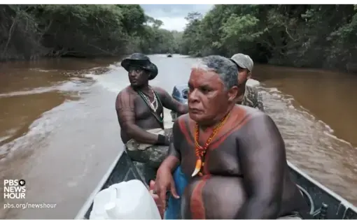 Guajira Indians who call themselves, The Guardians of the Forest and their leader Claudio Da Silva patrolling their ancestral lands. Image from PBS NewsHour. Brazil, 2018.
