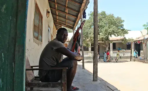 Human rights activist and journalist Mustapha Manneh returned from Cyprus in 2017, after fleeing Yahya Jammeh's brutal rule. Image by Nosmot Gbadamosi. Gambia, 2018.