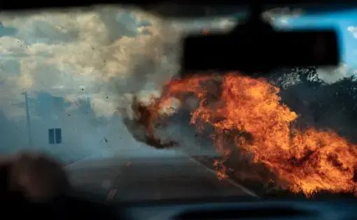 Fire raging along the Trans-Amazonian Highway. Image by Spenser Heaps. Brazil, 2019.