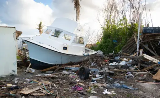 Damage and debris on Great Abaco Island in the aftermath of Hurricane Dorian. Image by Paul Dempsey / Shutterstock. Bahamas, 2019.