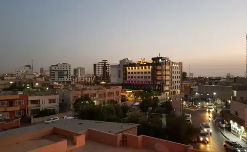 The Ankawa neighborhood in Erbil, during sunset one evening ahead of an independence referendum. Image by Kenneth R. Rosen. Iraq, 2017.