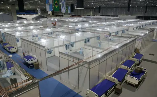 Rio de Janeiro, Brazil. April 29, 2020. An overview of an emergency field hospital is seen at Riocentro to receive COVID-19 patients. Image by Antonio Scorza / Shutterstock. Brazil, 2020.