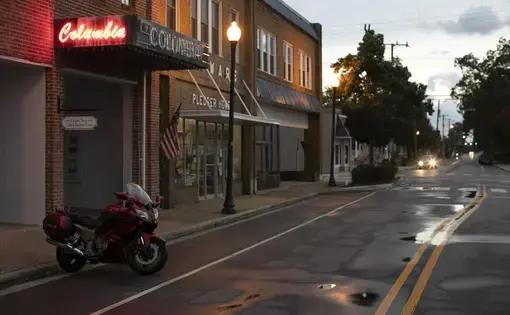 Main Street in Columbia, N.C., is quiet after a late-afternoon thunderstorm on July 23, 2020. Columbia is the county seat of Tyrrell County, with fewer than 4,000 residents. Image by Robert Willett / The News &amp; Observer / North Carolina News Collaborative. United States, 2020.