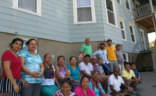 A group of Bhutanese refugees residing in the greater Worcester area with Purna Neupane (fourth from right), Harvard Medical School researcher Dr. Nadeem Kasmani (third from right), and Washington University in St. Louis student Ani Gururaj (second from right). Image courtesy of Ani Gururaj. Massachusetts, 2018.