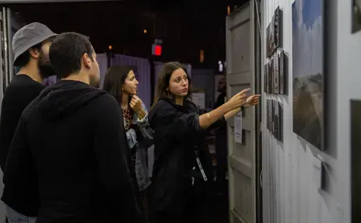 Nariman el-Mofty at the exhibit of her award-winning photographs from Yemen at Photoville. Image by Claire Seaton. United States, 2019.