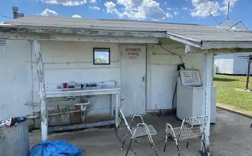 An image of the bathrooms farmworkers share in a migrant camp in Delta, Ohio.&nbsp;Image by&nbsp;Areeba Shah. United States, 2020.