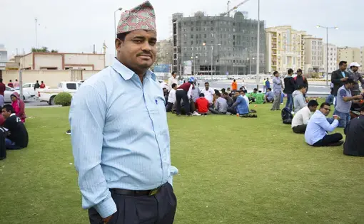Dhurba B.K. attends a gathering of Nepalese migrant workers in Doha, Qatar. B.K. is one of about 400,000 Nepalese workers there, many of whom struggled with whether to stay after an April 2015 earthquake damaged huge portions of Nepal. Image by Shilu Manandar. Qatar, 2016.