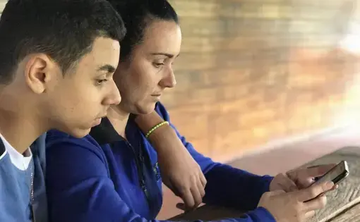 Addis Torres, at the shelter with her husband and their 13-year-old son, was devastated by the news. Image by Mario J. Penton. Panama, 2017.