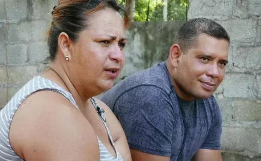 Yudenny Sao Labrada and her husband Yoendry Batista in their rental house in Panama City, Panama. Image by Jose A. Iglesias. Panama, 2017.