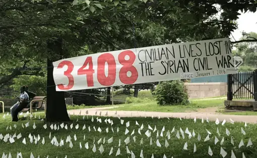 The visual installation of white flags was one of many projects Central High School students worked on to educate their community on the Arab Spring. Image by Ken Hung. Pennsylvania, 2018.