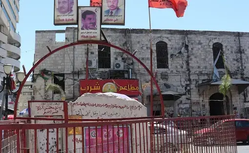 Nablus residents erected a memorial in honor of the individuals who died during one of the clashes between Israeli soldiers and Palestinian resistance fighters. It’s one of many around the city. Image by Carly Graf. Palestine, 2019.