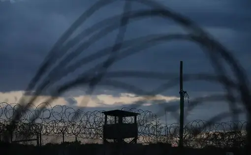 Mohammed al-Qahtani was brutally interrogated at Camp X-Ray, above, a detention facility at Guantánamo Bay. Image by Doug Mills/The New York Times. United States, undated.