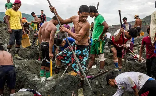 Freelance miners dig for raw jade at a company site in Hpakant, Myanmar, in 2018. Image by Hkun Lat. Myanmar, 2018.