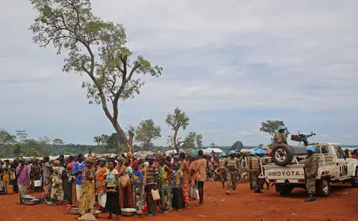 Displaced people wait for rations in Bria, Central African Republic, on Sept. 26. Image by Cassandra Vinograd. Central African Republic, 2017.