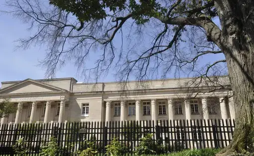 There have been over 3,000 bankruptcy filings in North Carolina since the COVID-19 pandemic began. Federal bankruptcy courts like Charlotte’s, based in the Charles R. Jonas Federal Building, above, have continued to see a steady stream of filings despite extraordinary measures to stem economic bleeding. Image by Robert Lahser. United States, undated.