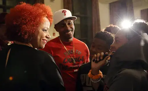 Nikole Hannah-Jones talks with a student at the University of Chicago's Institute of Politics 1619 event. Image by Dylan Burrus, Courtesy of the University of Chicago's Institute of Politics. United States, 2019.