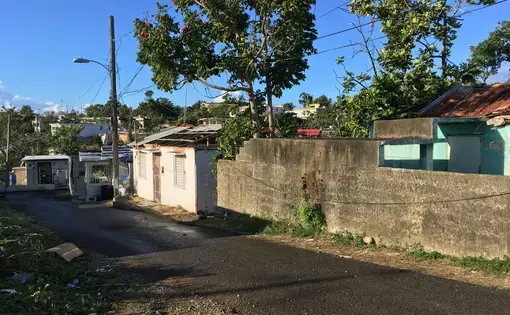 A row of houses in Guayama, destroyed and unfixed six months after Hurricane Maria. Image by Isabel S. Dieppa. Puerto Rico, 2017. A row of houses in Guayama, destroyed and unfixed six months after Hurricane Maria. Image by Isabel S. Dieppa. Puerto Rico, 2017.