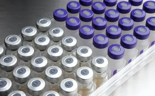 The United States, China, and other countries are ramping up production of experimental COVID-19 vaccines—a Beijing production line for one is shown here—but a limited supply of the first one with proven efficacy will likely still complicate the ethics of testing the other candidates. Image by&nbsp;Jim Barber / Shutterstock. Undated.