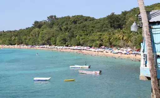 Lined with restaurants and shops, the beach in Sosua, Dominican Republic, is frequented by locals and foreigners. Image by Emily Codik. Dominican Republic, 2017. Lined with restaurants and shops, the beach in Sosua, Dominican Republic, is frequented by locals and foreigners. Image by Emily Codik. Dominican Republic, 2017.
