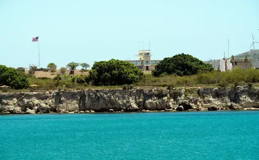 This photograph, reviewed and approved by the U.S. military, shows Guantánamo Bay, Cuba. Image by Doug Mills/The New York Times. United States, undated.