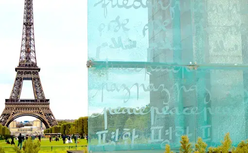 On the Wall of Peace, erected near the base of the Eiffel Tower in 2000, the word ‘peace’ is inscribed in 49 different languages. The monument and its inscriptions are a call for action towards meaningful inclusion and a more peaceful reality. Image by Charlotte Bellomy. France, 2015. Media file: 15_years_of_promoting_peace.jpg