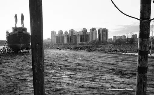 Bychiy Island on the Neva River has long been home to a children's ecological school and student yacht club. It is now being developed into a private, $100 million judo mega-complex, headed by Arkady Rotenberg, President Vladimir Putin's childhood sparring partner. Putin, a black belt in judo, serves as the club's honorary president. Image by Misha Friedman. Russia, 2015. Media file: unnamed.jpg