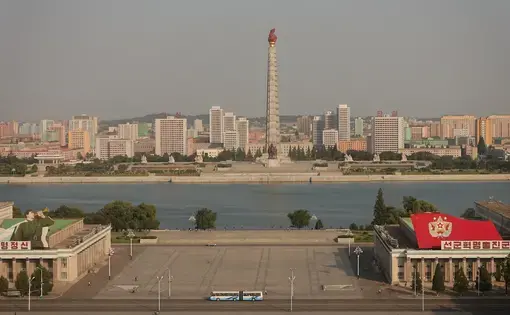 Kim Il-sung Square, against a backdrop of the Taedong river and the Juche Tower on the other side. Photo by Laya Maheshwari. Image by Laya Maheshwari. North Korea, 2016.