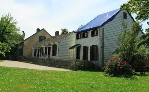 19th-century houses in formerly Weeksville town, preserved as part of the Weeksville Heritage Center, offer a glimpse into Brooklyn's past. Image by Lennox Wright / Shutterstock. United States, 2019.