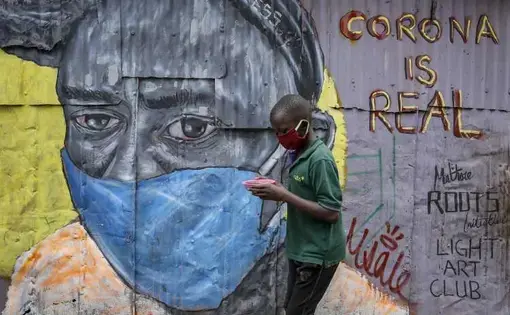 COVID-19 graffiti in Kibera slum, Kenya. Image by Henry Owino. Kenya, 2020.