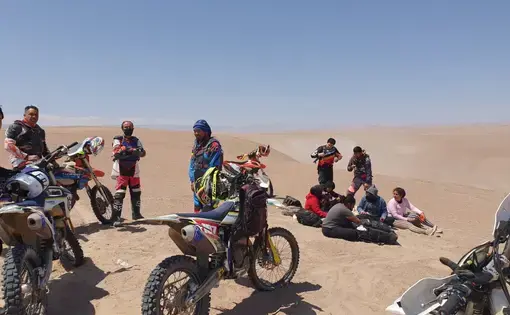 The motorcyclists with the second group of Venezuelans. Image courtesy of Team Tuareg. Chile, undated.