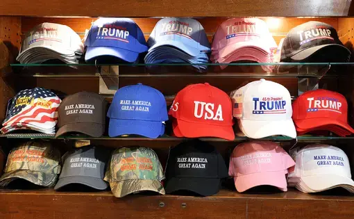 A selection of Donald Trump and Make America Great Again MAGA hats for sale in New York, NY on July 16, 2017. Image by Katherine Welles / Shutterstock.com. United States, 2017.