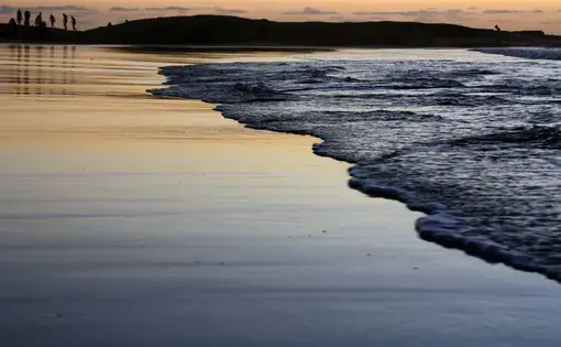The tide rolls in on the shores of Cape Town, South Africa. Prospecting rights for offshore mining cover 10 percent of the country's exclusive marine economic zone. Image by Mark Olalde. South Africa, 2016.