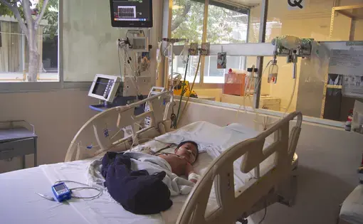 A six-month old baby boy who is suffering from chronic seizures resulting from untreated gastroenteritis