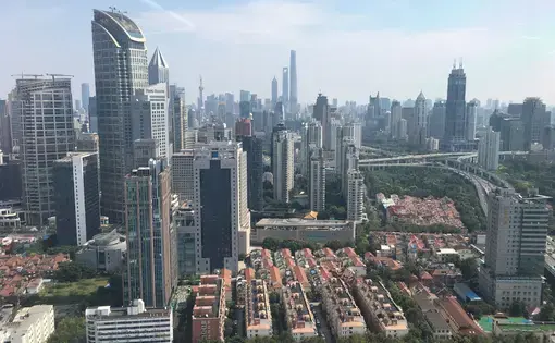 The view of Shanghai on Sunday, Sept. 30, 2017, from the Shanghai Daily newsroom. Image by Kelsey Kremer. China, 2017.