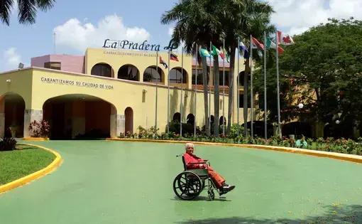 Zuby Malik in front of health facility La Paradera in Havana where she began treatment with the lung cancer vaccine CimaVax this summer. Image by Nauman Malik. Cuba, 2016.