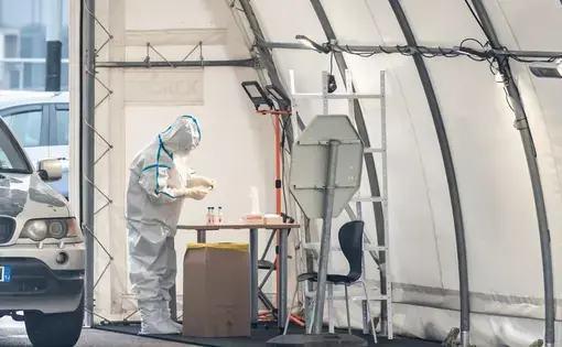 A mobile COVID-19 testing station in Vilnius. Image by Michele Ursi / Shutterstock. Lithuania, 2020.
